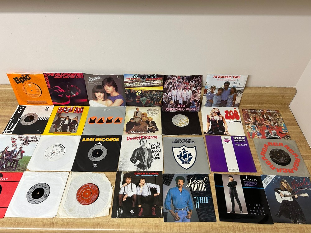 27 1980’s Singles 45 RPM 7 inch Vinyl Records from various groups ( UK Release)