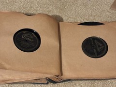 Lot of Nine (9) 78 rpm records in beautiful condition, in a book see list
