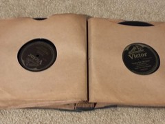 Lot of Nine (9) 78 rpm records in beautiful condition, in a book see list